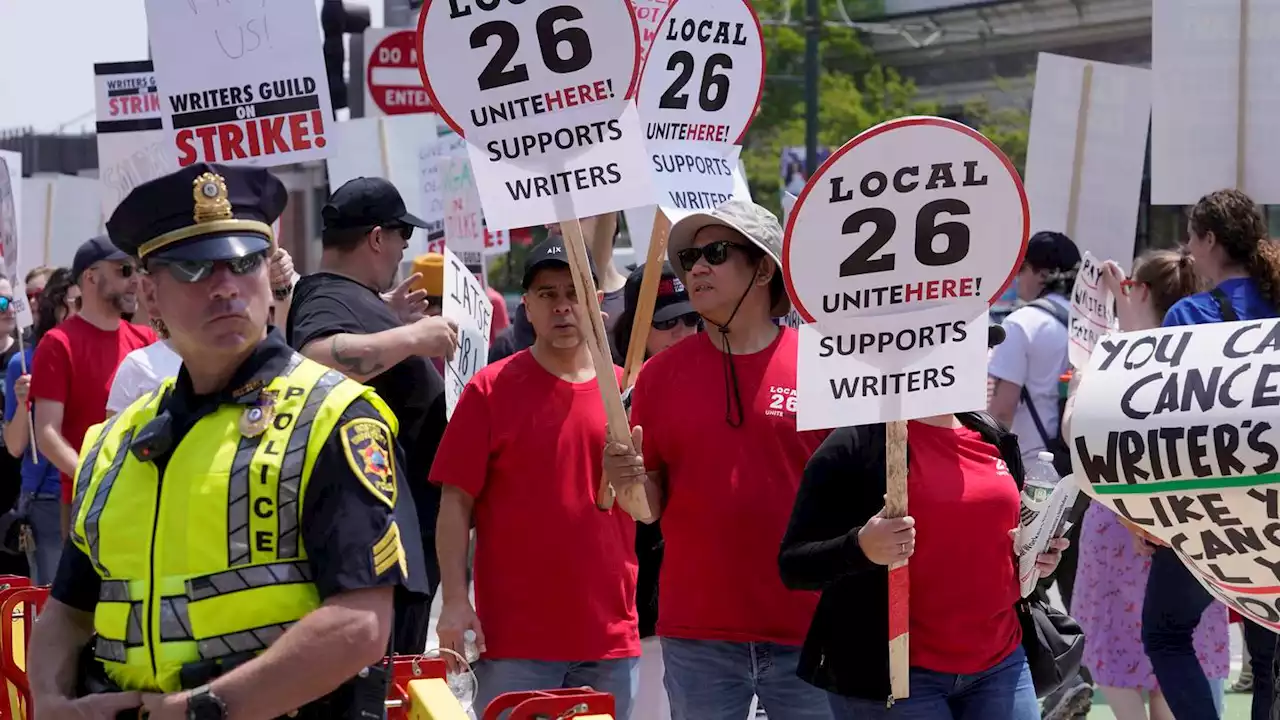 Warner CEO booed at Boston University as supporters of writers' strike picket outside