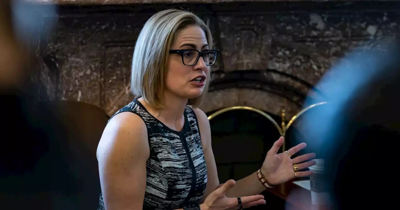 Sinema focuses on immigration as she weighs second term in the Senate