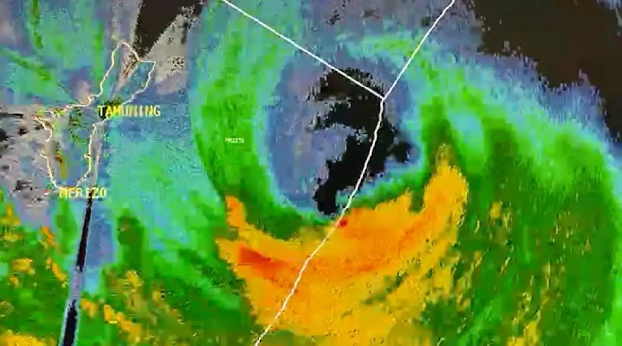 ‘Mawar’ passing over Guam as Category 4 storm with strong winds, rain