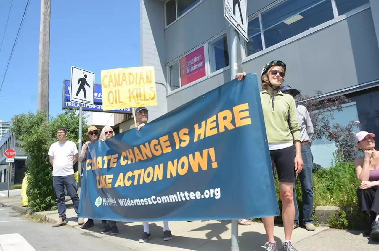 Dozens of MPs face protesters calling for emissions cap for fossil fuel companies