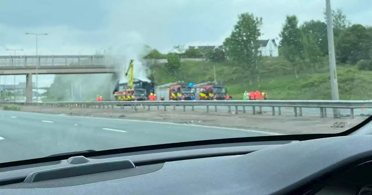 LIVE: M60 CLOSED as lorry fire leaves smoke billowing across motorway