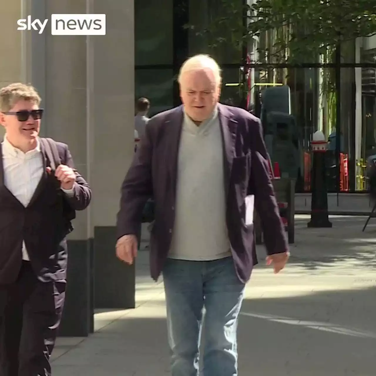 Prince Harry hacking trial latest: John Cleese turns up in courtroom - amid row over new evidence to 'scare off witnesses'