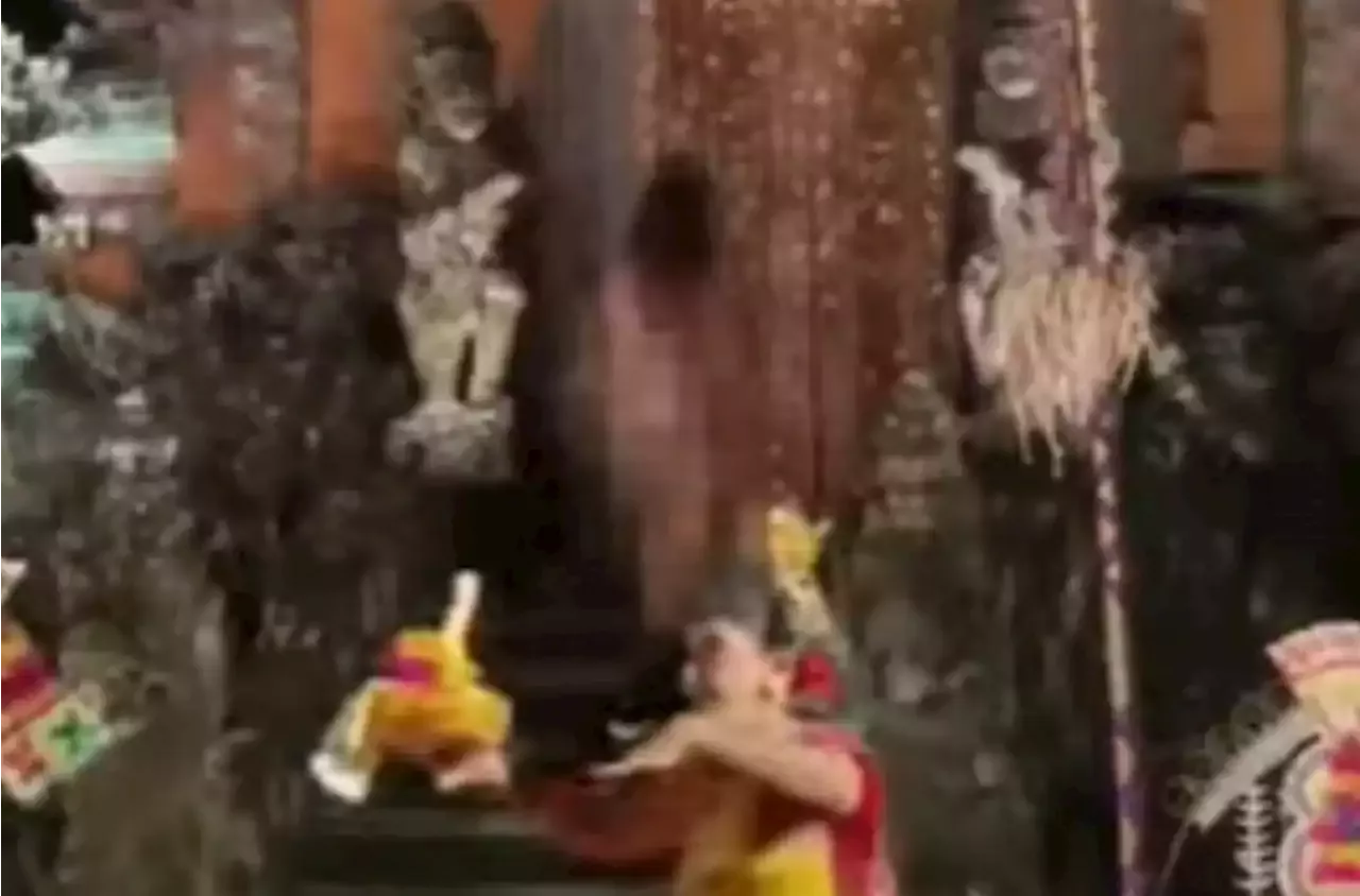 German female tourist held after stripping naked at Bali temple ceremony