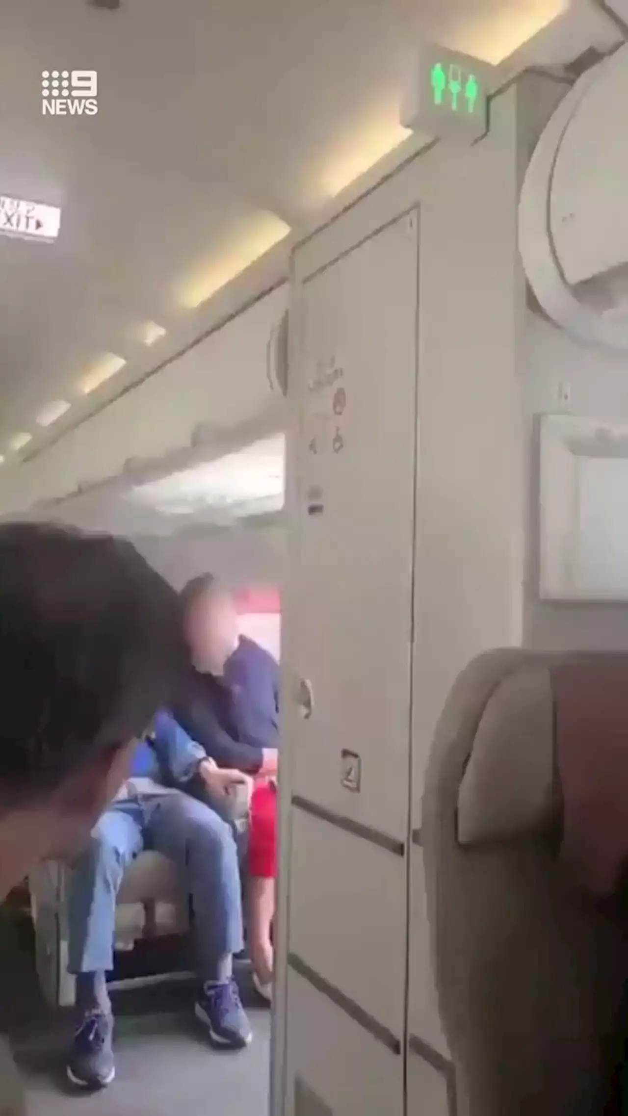 Passengers injured after one person opens exit door during flight in South Korea