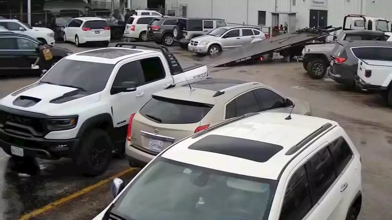 Watch Brazen Thieves In Stolen Cadillac Steal RAM TRX From Dealer During Business Hours | Carscoops