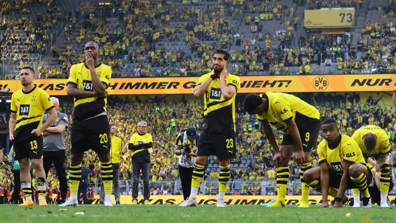 Dortmund's title dreams in tatters after shock home draw to Mainz