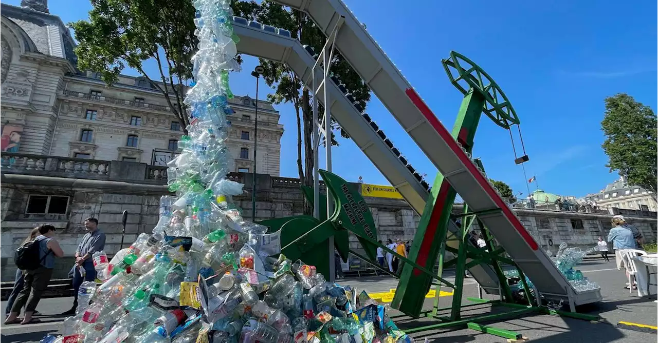 Plastic-spewing artwork unveiled for Paris talks against waste