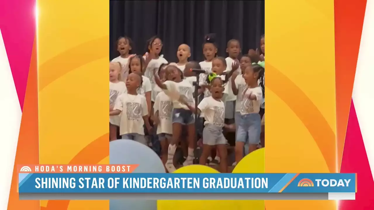 Little girl steals the show at kindergarten graduation performance