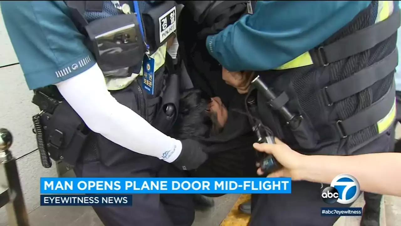 Man formally arrested, says he opened emergency doors mid-flight because he felt suffocated