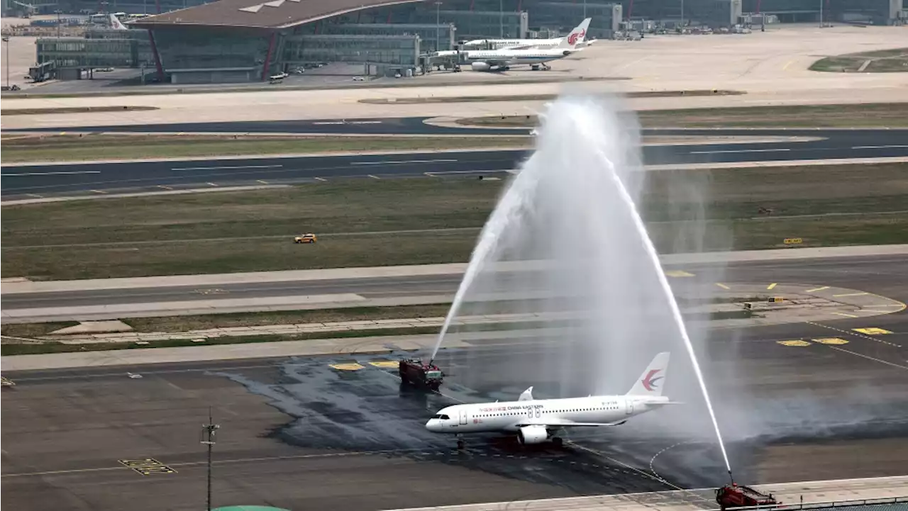 China's 1st domestically made passenger plane completes maiden commercial flight