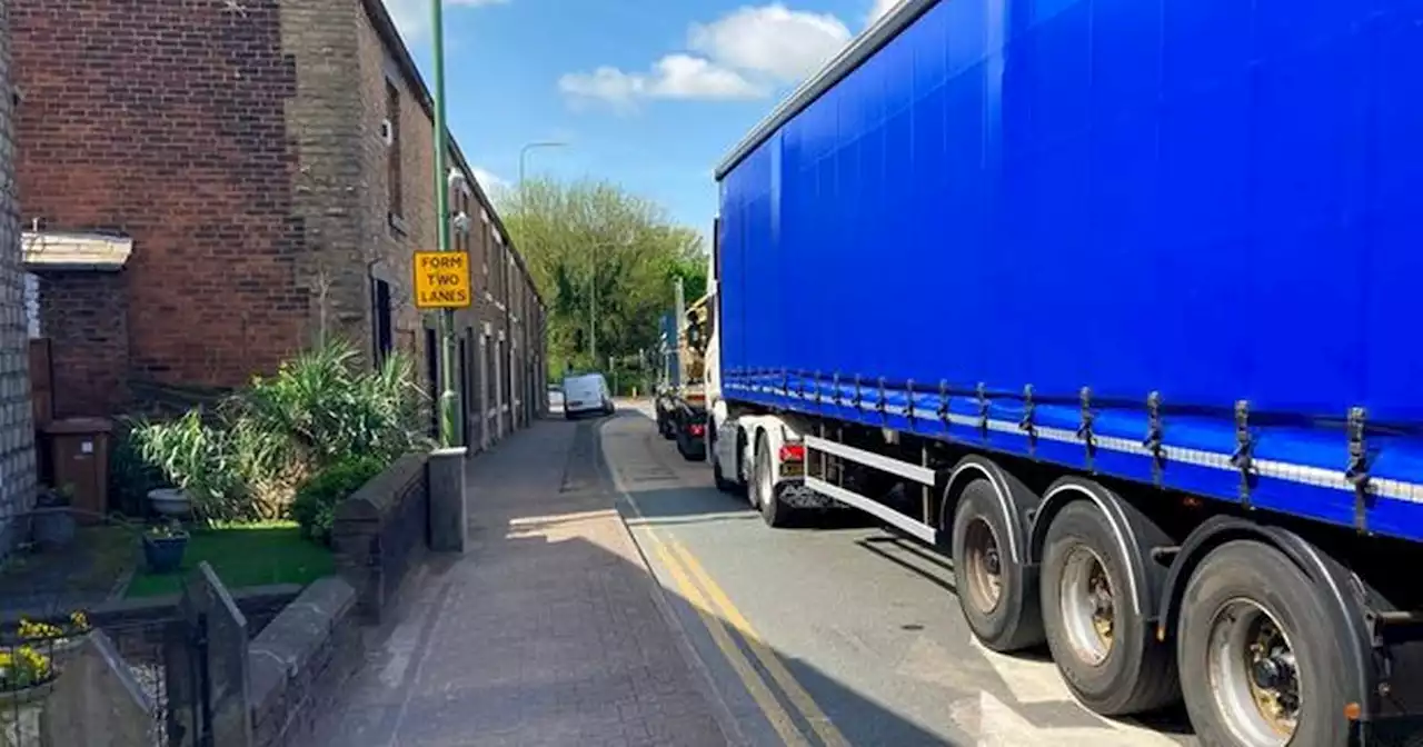 Village where you 'can't open windows' due to 2000 HGVs roaring through daily