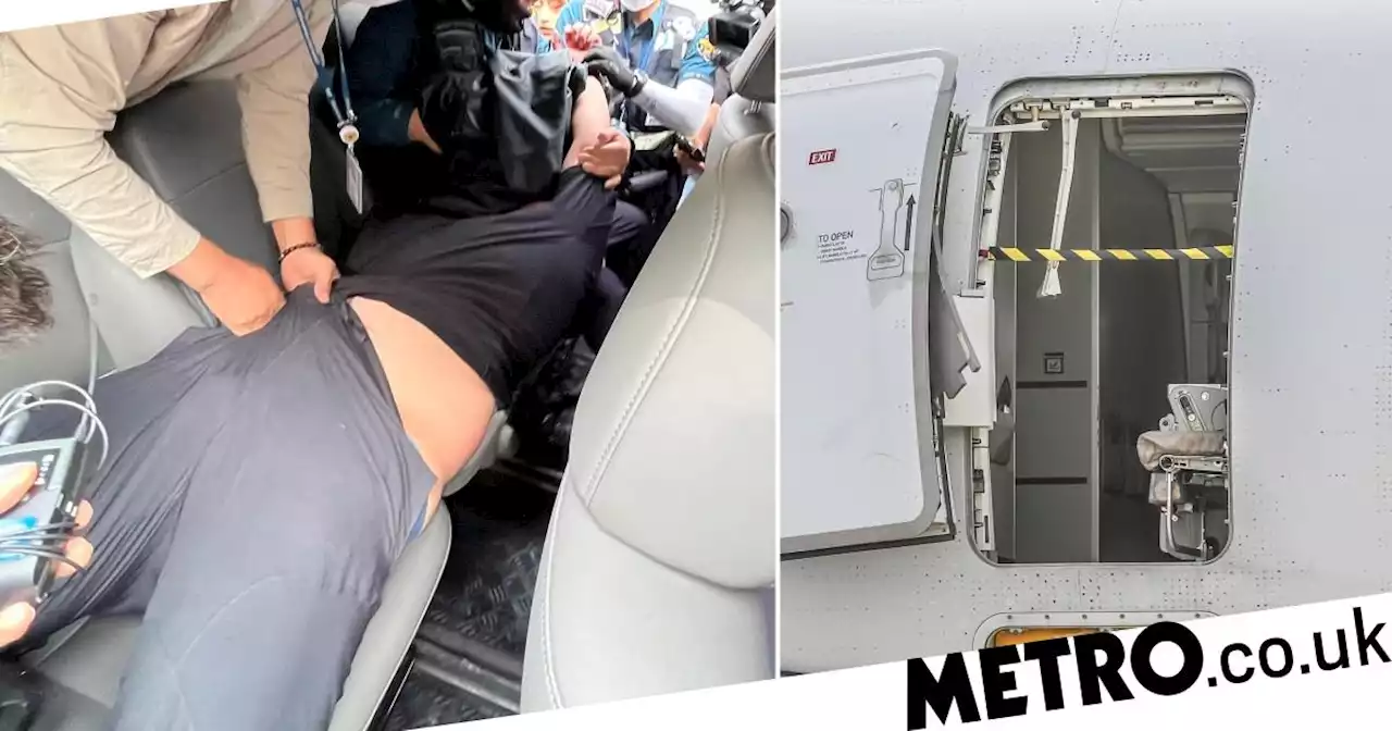 Passenger who opened plane door mid-flight says he was feeling 'uncomfortable'