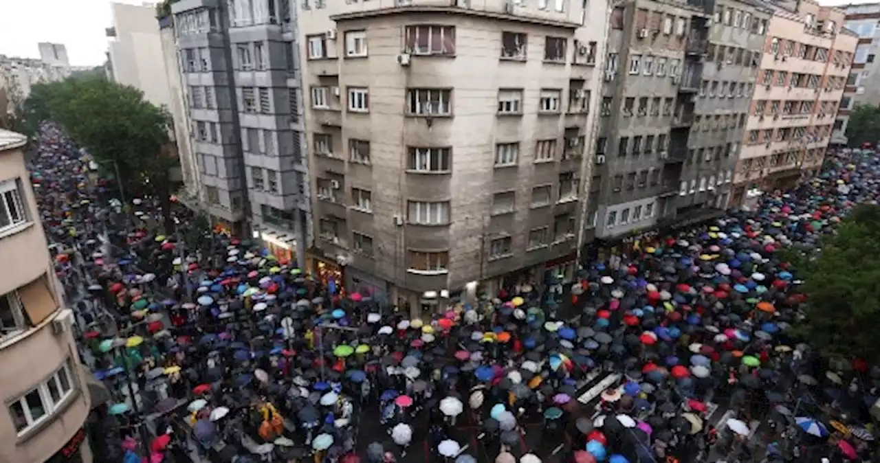 Tens of thousands in Serbia protest mass shootings, government policies