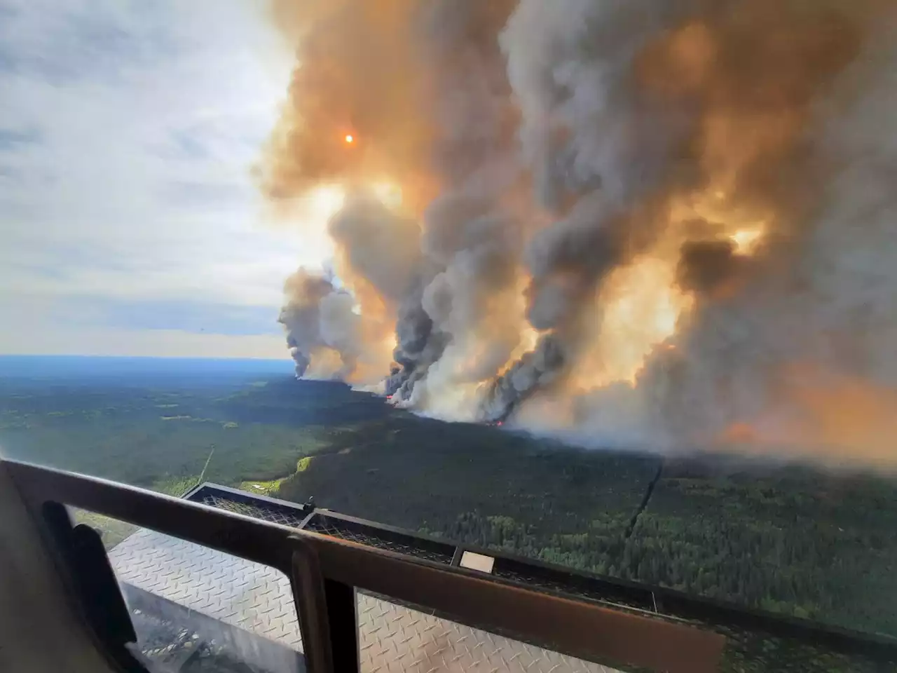 Northeastern B.C. wildfire grows as evacuations return north of Fort St. John