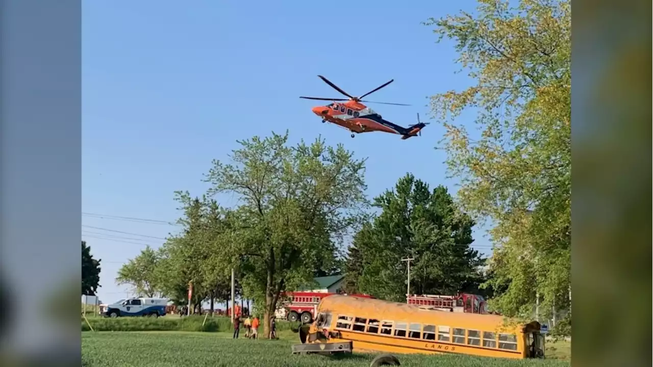 Police officer, school bus driver killed in violent crash north of Woodstock, Ont.