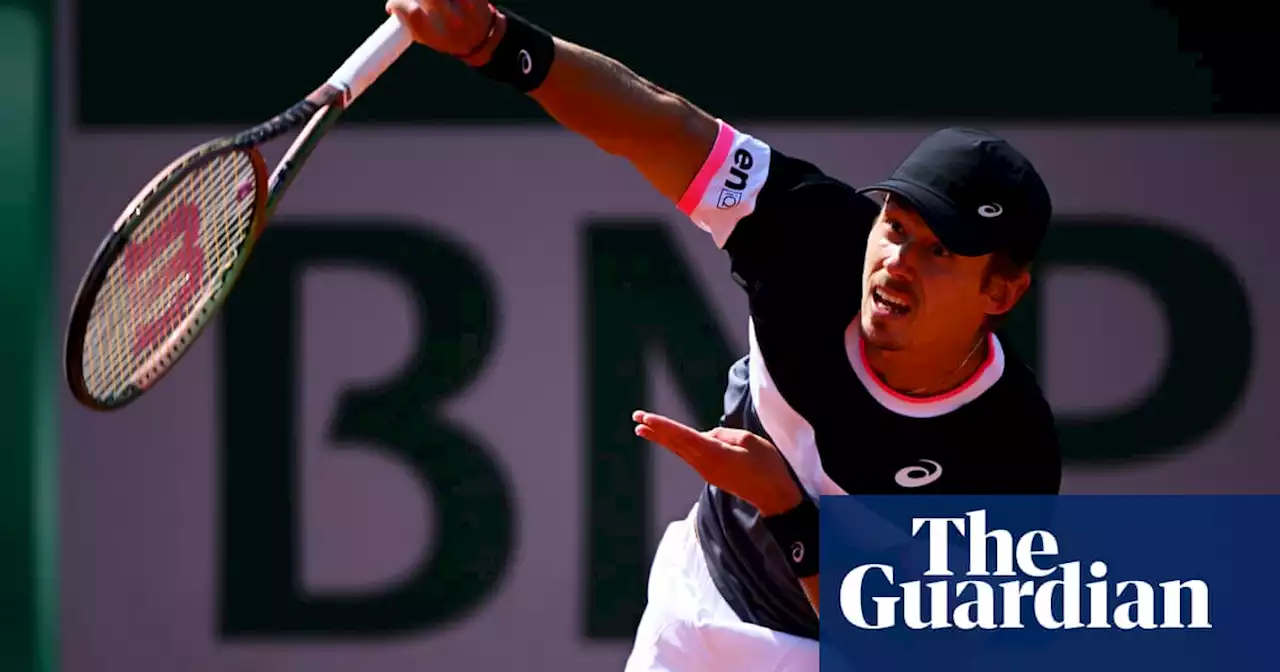 Alex de Minaur finds his feet on clay to reach second round of French Open