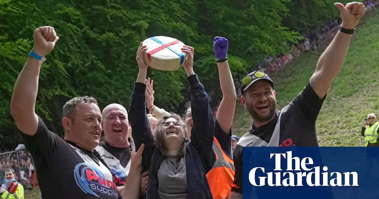 Woman wins UK cheese rolling race despite being knocked unconscious