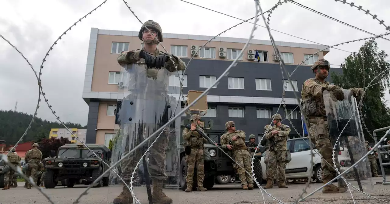 NATO peacekeepers secure Kosovo town halls in standoff with Serb protesters