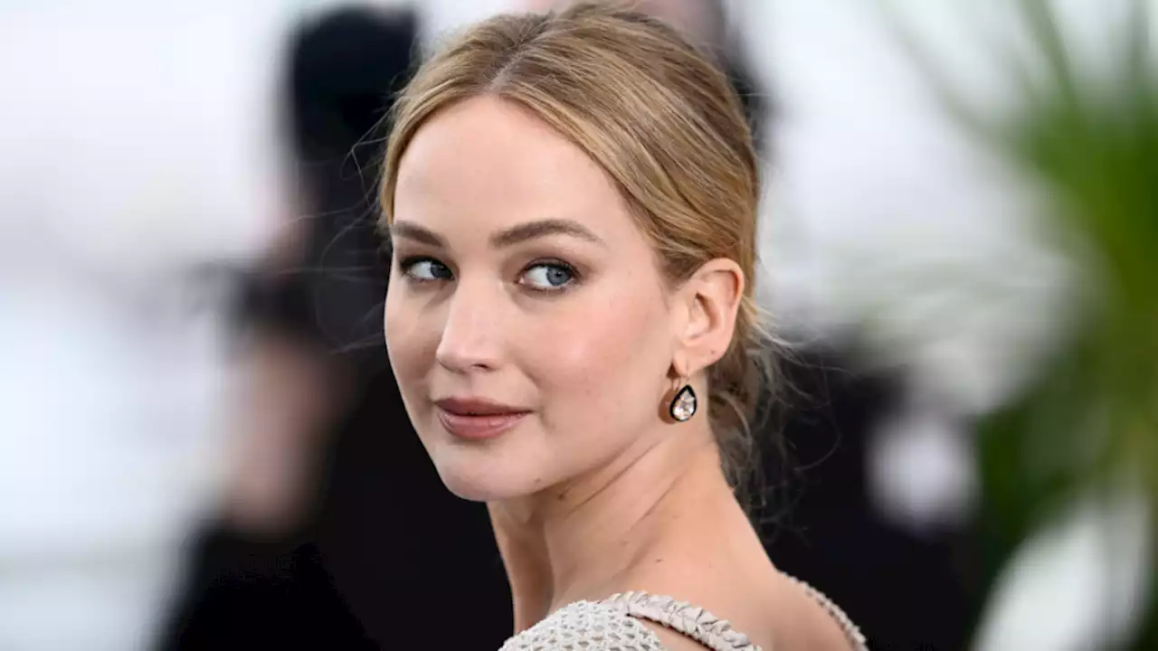 Jennifer Lawrence’s Cannes Look Featured Flip Flops & A Christian Dior Gown