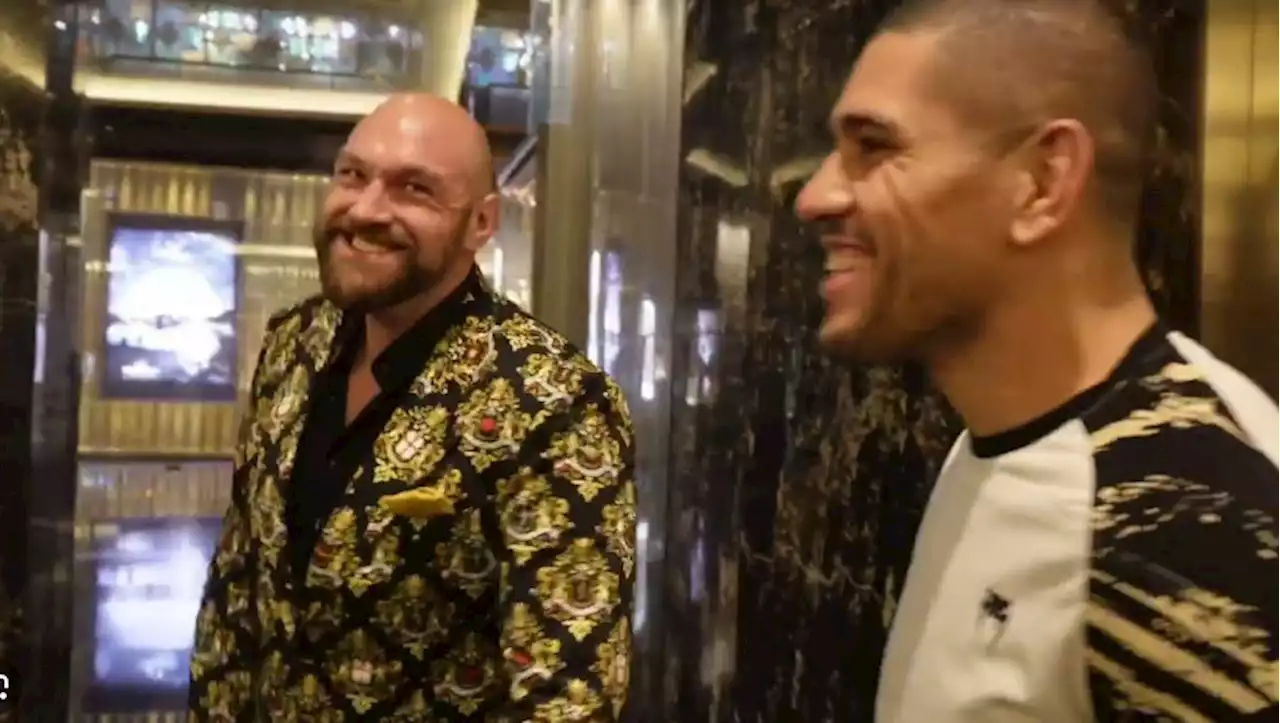 Tyson Fury shoots for fake takedown during meeting with former UFC champion Alex Pereira