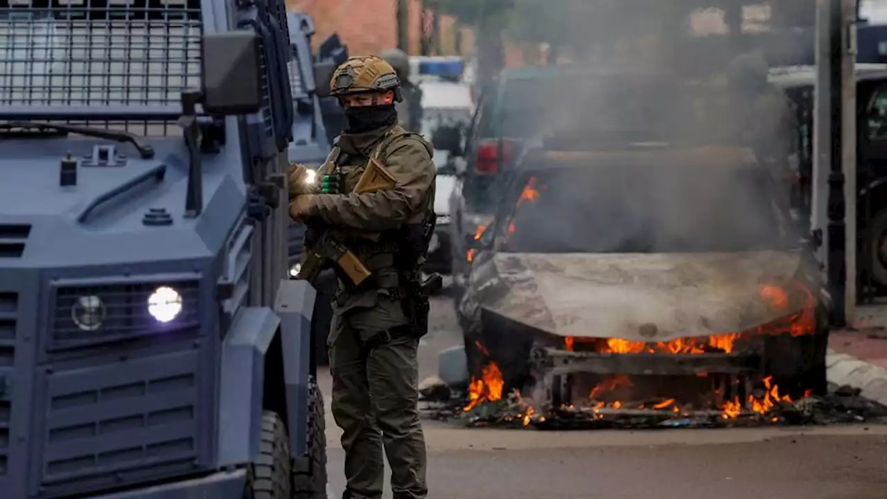 NATO soldiers guard Kosovo towns in stand-off with Serb protesters