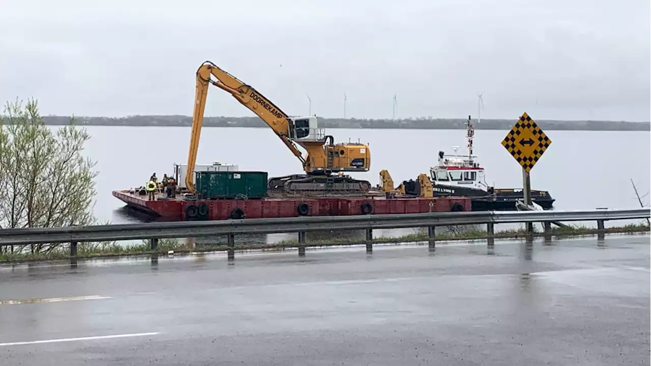 Police recovering human remains and car from Lake Ontario