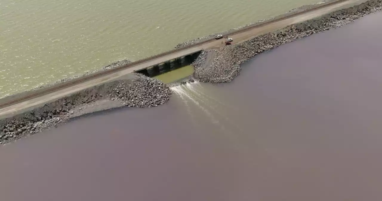 Water now spilling over emergency causeway berm in the Great Salt Lake