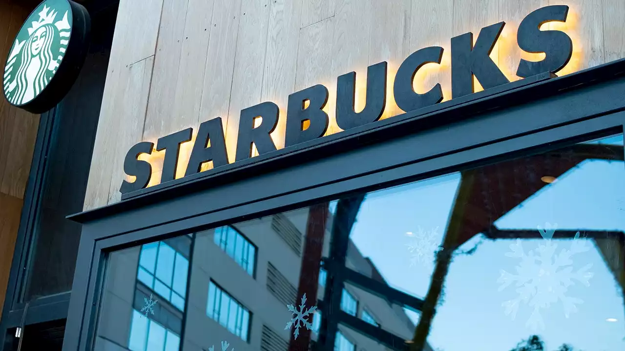 Starbucks profits beat estimates, shares dive on outlook