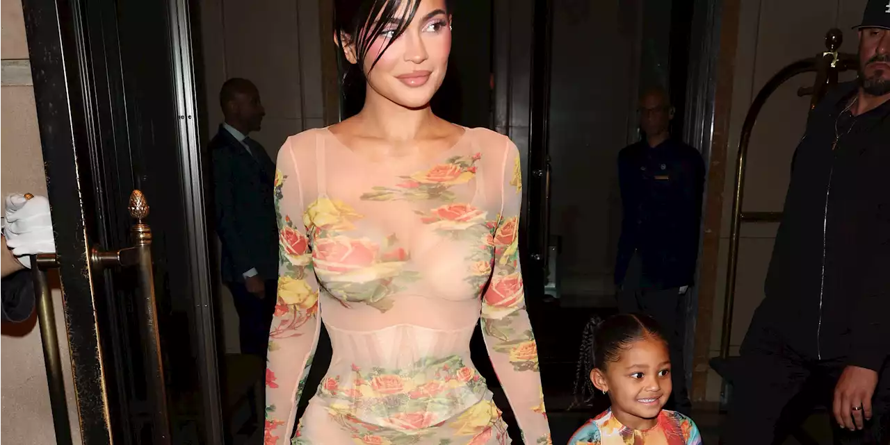 Kylie Jenner Wears a Sheer Floral Dress with a Corset to a Party with Daughter Stormi