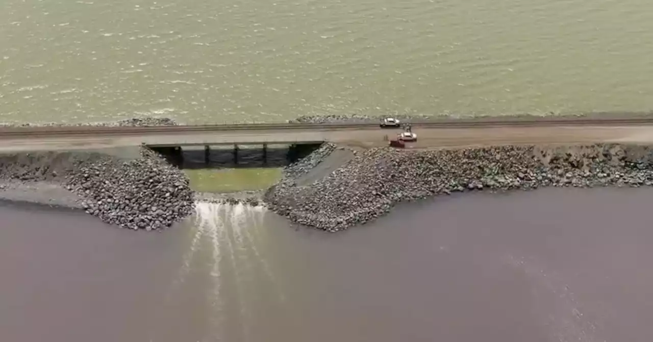 Water now spilling over emergency causeway berm in the Great Salt Lake