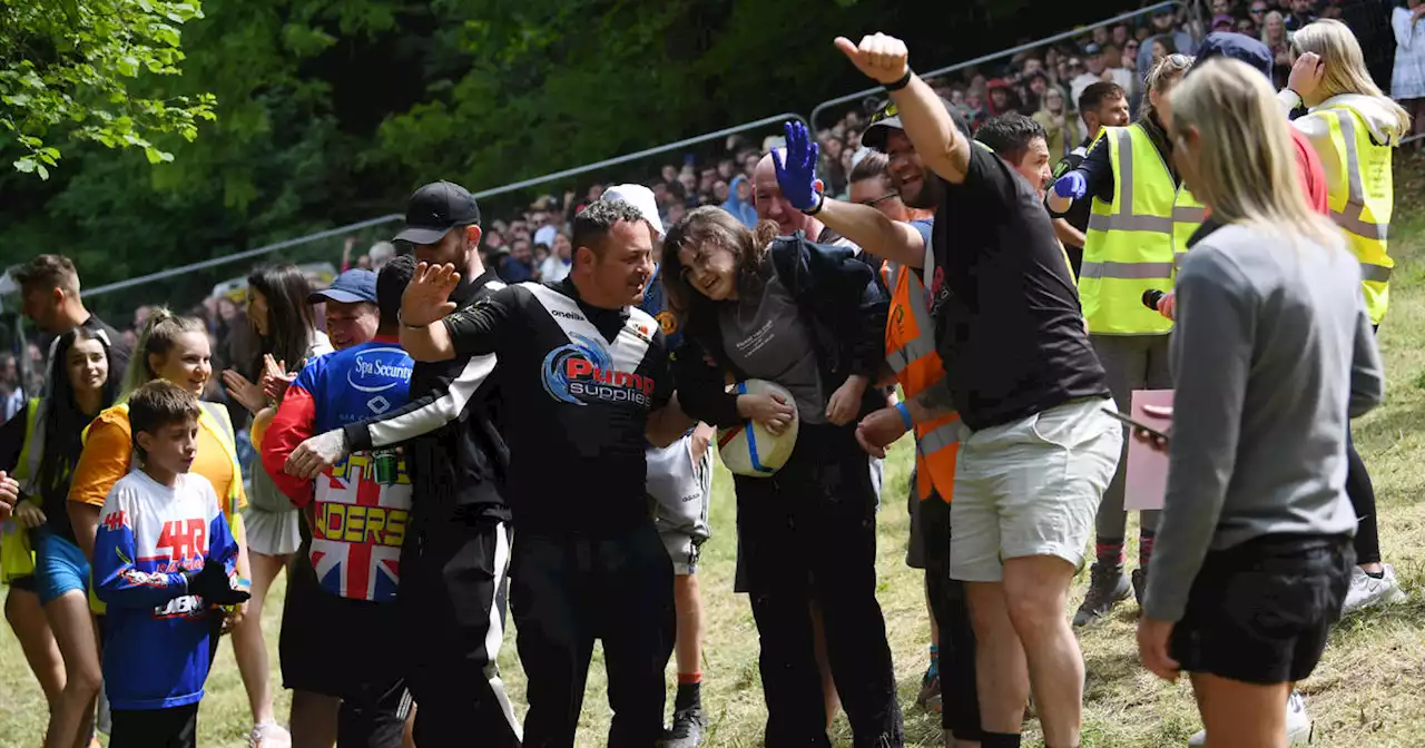 Woman wins chaotic U.K cheese race despite being knocked unconscious