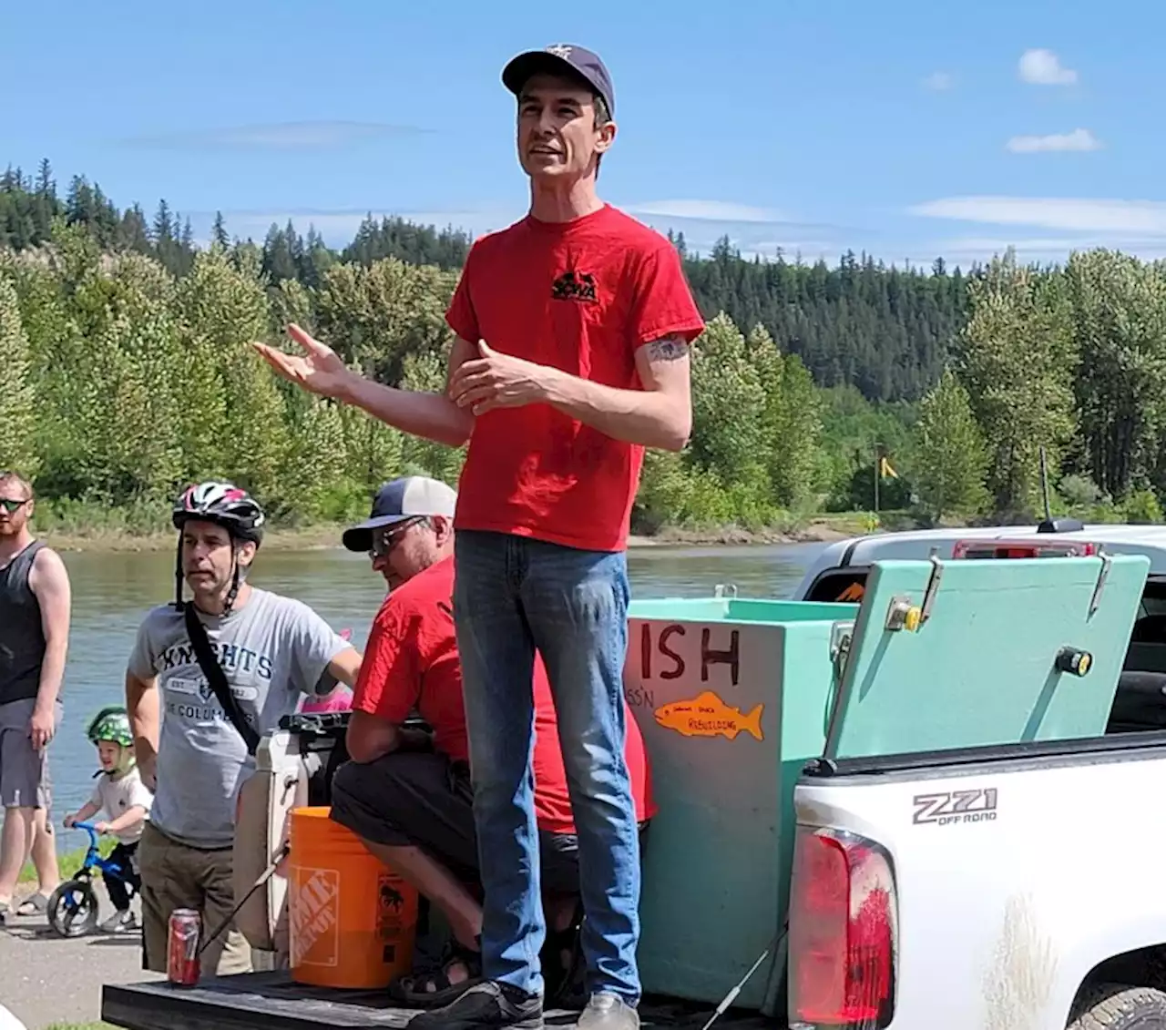 Prince George comes together to release 1,000 salmon into the Nechako River