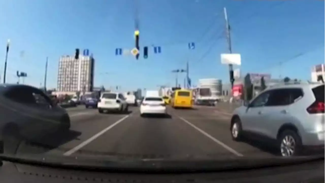 Falling weaponry narrowly misses moving car on Kyiv road