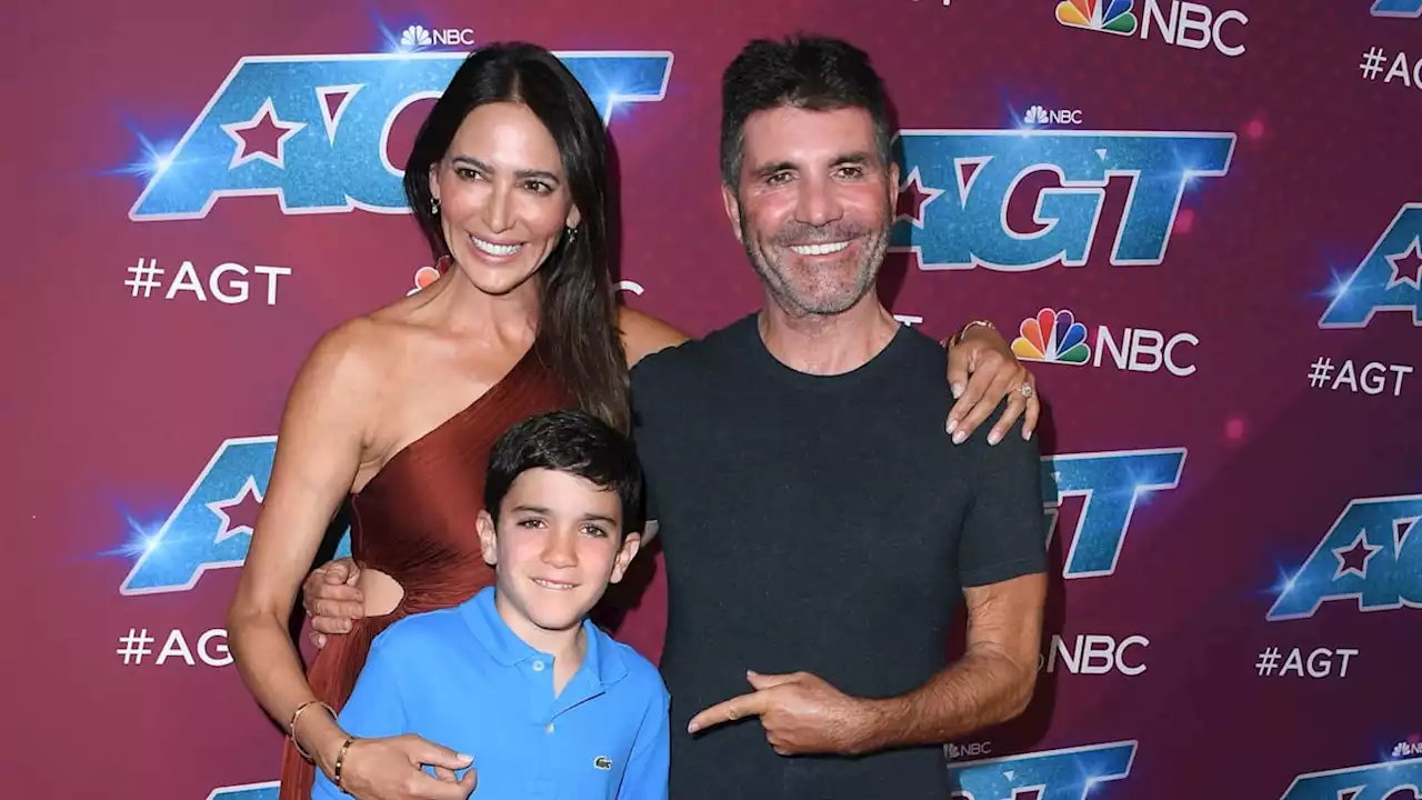 Simon Cowell's son Eric beams in rare outing with parents - and he's just like his dad!