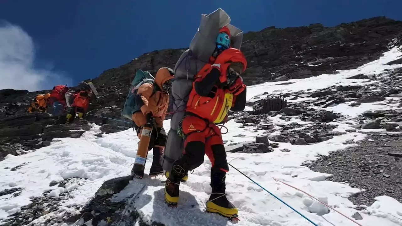 Sherpa guides rescue freezing climber from Everest 'death zone' in 'almost impossible' mission