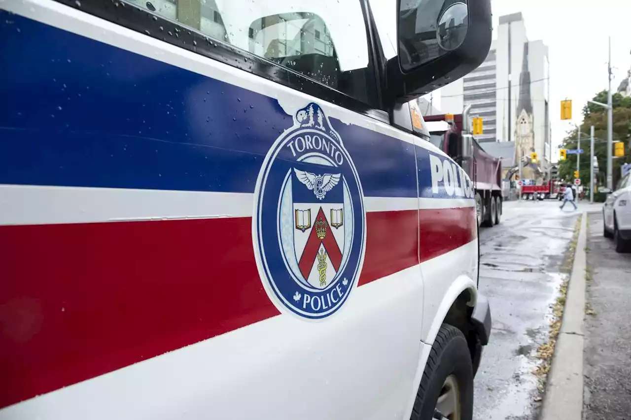 Man with life-threatening injuries was struck while crossing the street by motorcyclist driving between lanes, said Toronto police