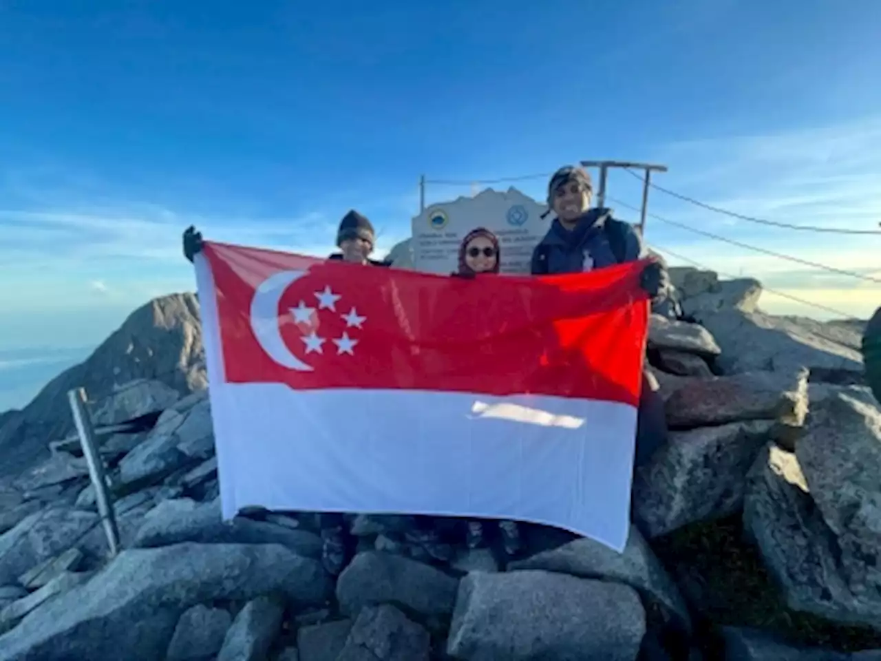 Singapore diplomat scales Mt Kinabalu as tribute to Sabah and to honour victims of 2015 quake