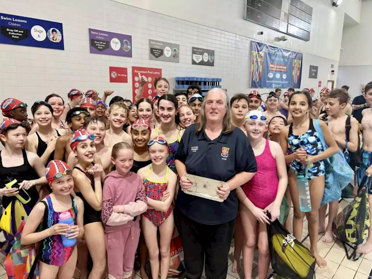 Inspirational swimming coach recognised with prestigious award