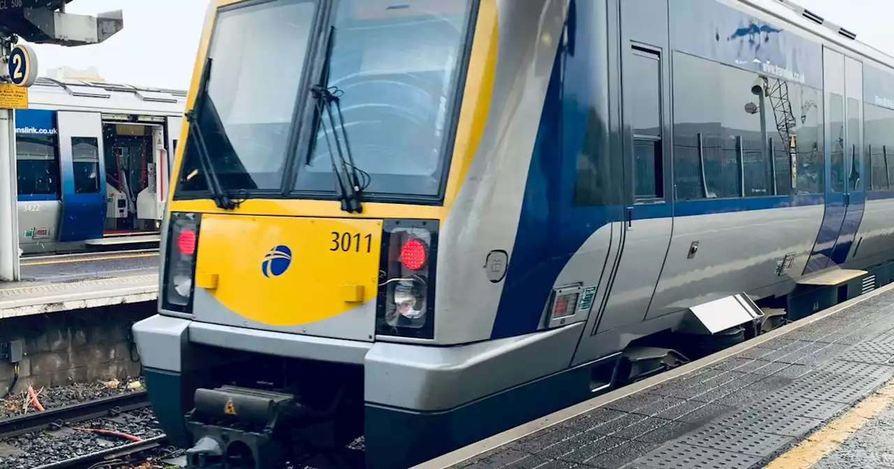 Three arrested after trains spray painted in Belfast