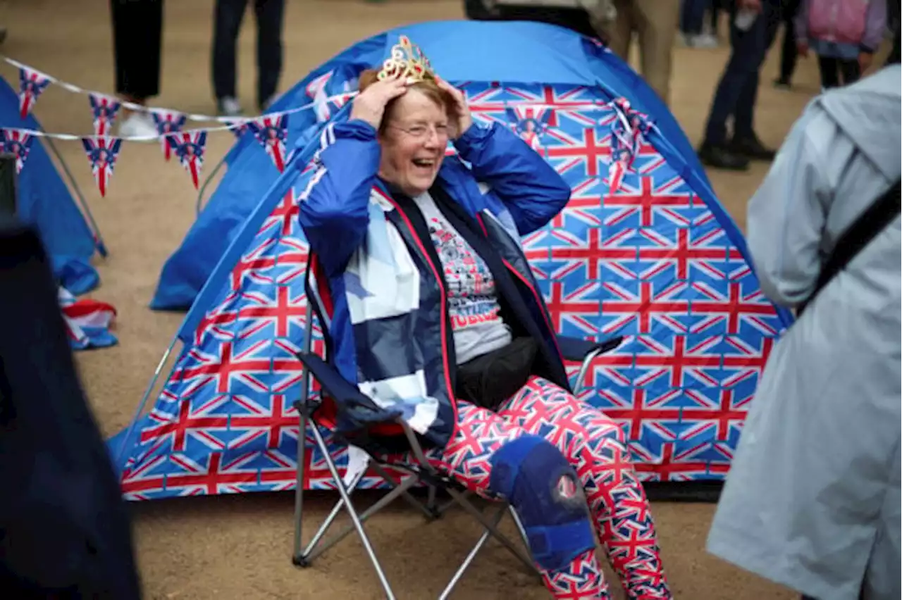 King Charles’ coronation draws tens of thousands in paper crowns and plastic tiaras