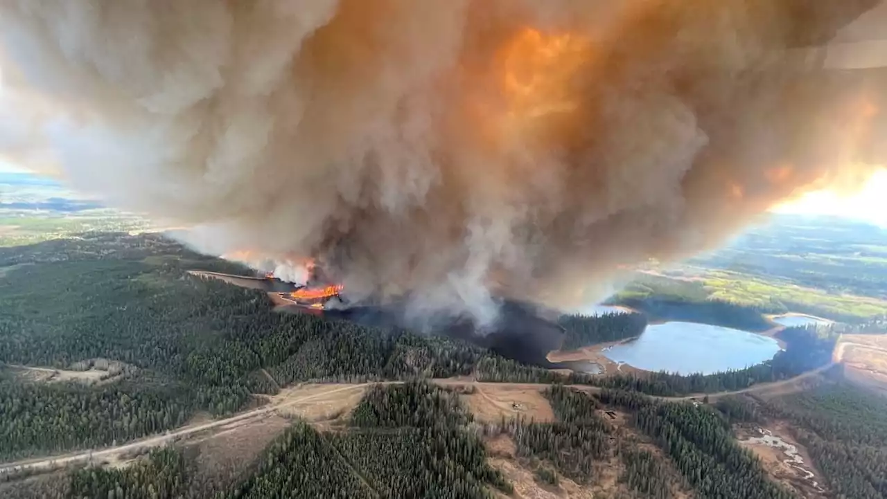 Fire and floods across western Canada force evacuations