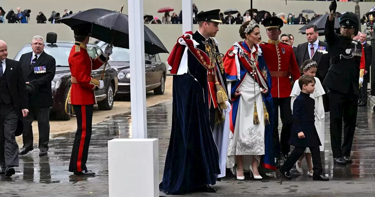 Kate Middleton hitches up Coronation dress due to weather as she ditches tiara