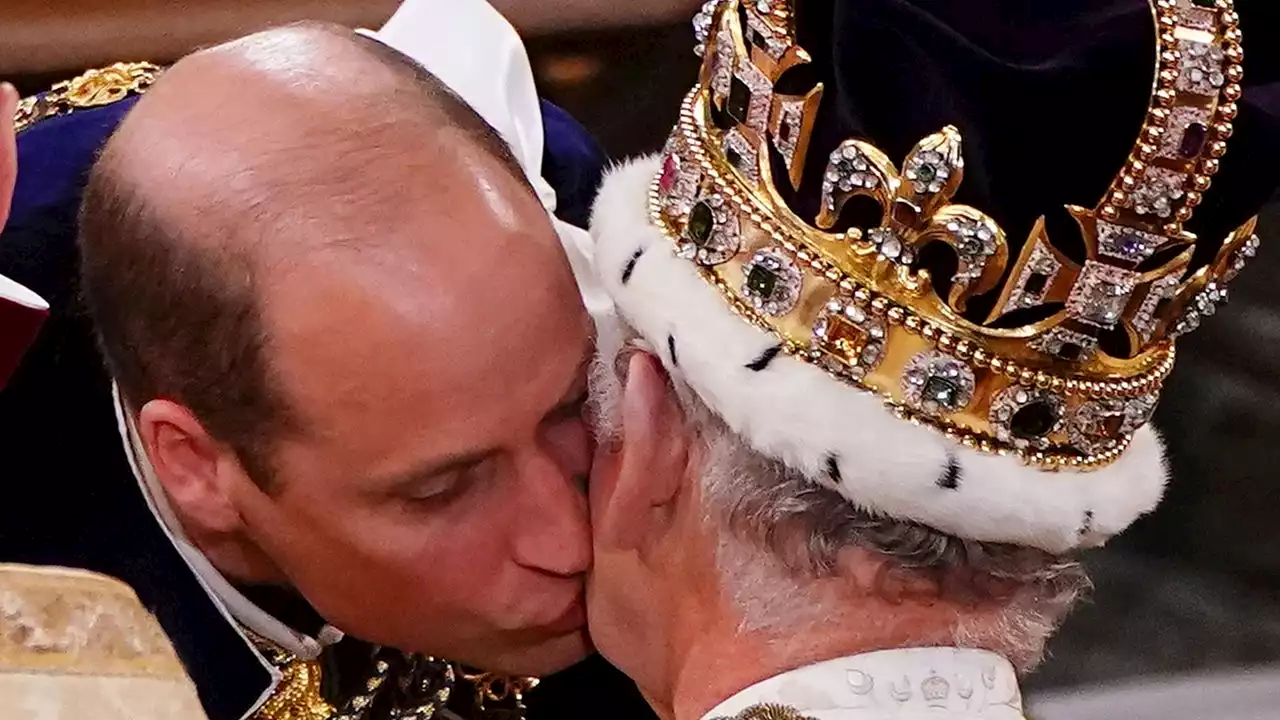 Prince William Kisses King Charles III on Cheek at Coronation