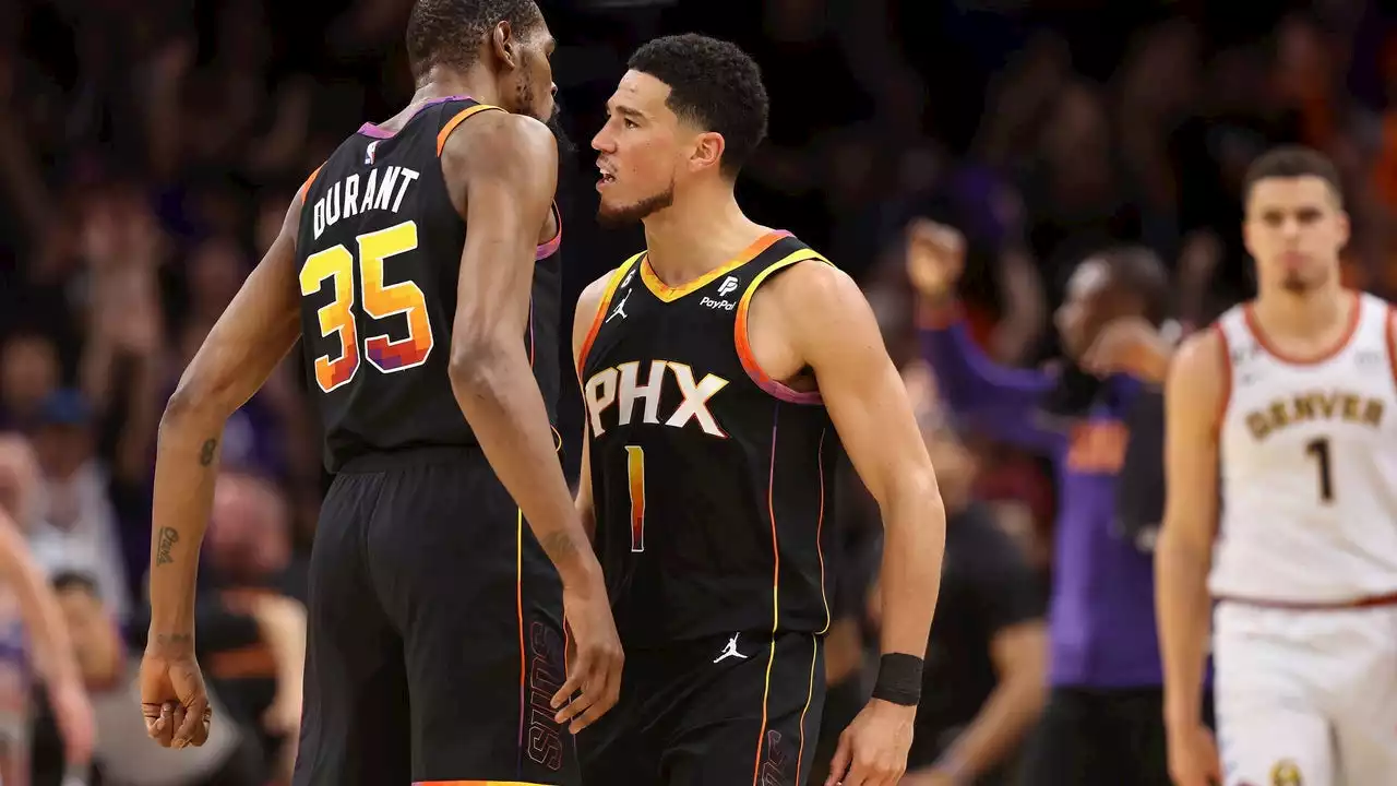 Booker scores 47, Durant adds 39, Suns beat Nuggets 121-114