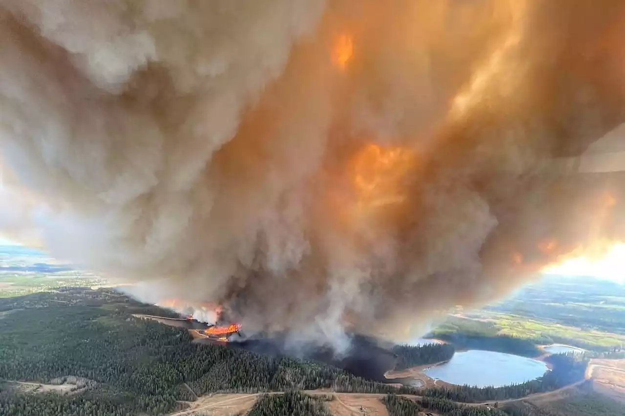 Several thousand people forced from homes as wildfires burn across Alberta