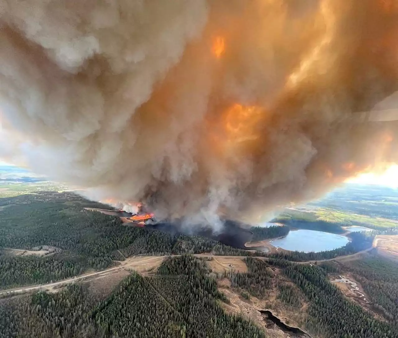 Fire and floods across western Canada force evacuations