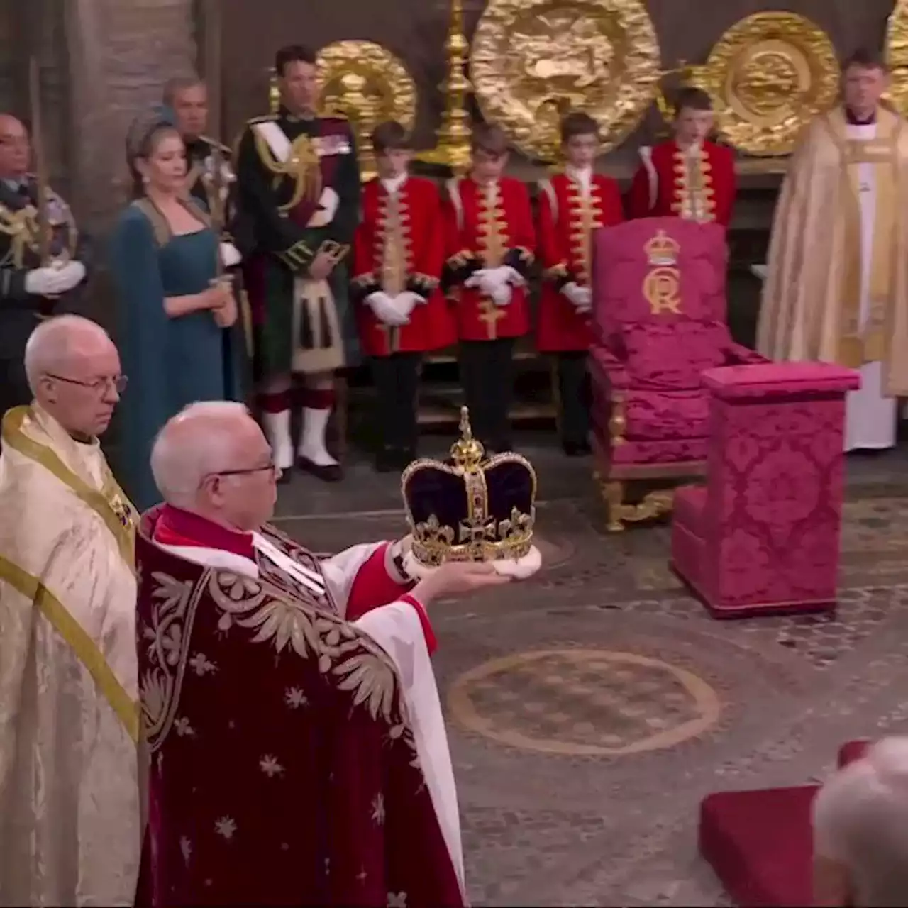 King Charles appears close to tears as he is finally crowned