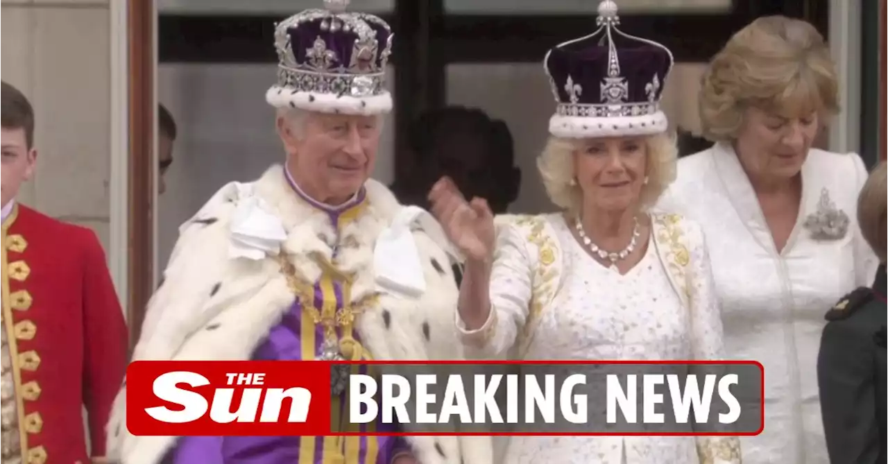 Charles & Camilla wave to cheering crowd from Palace balcony for flypast