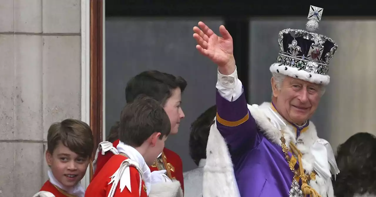 Who was on the Buckingham Palace balcony with Charles and Camilla, and who wasn't?