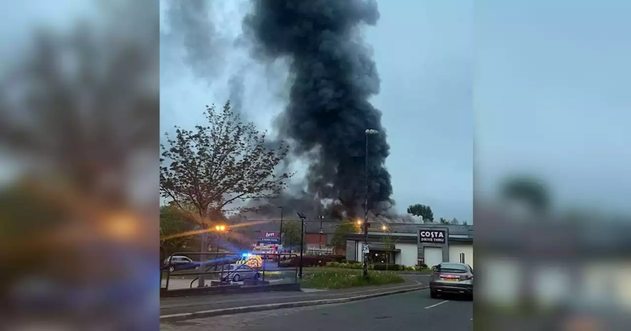 Fire crews rush to huge blaze at Blackburn retail park - updates